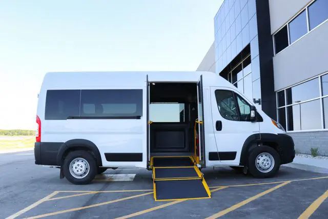 Wheelchair ramp extending from wheelchair van.